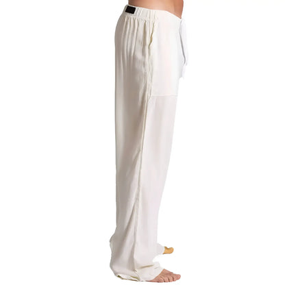 White loose-fitting Gigo Chalis beige pants with drawstring waist and subtle side seam detailing