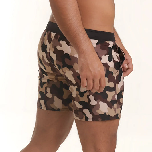 Camouflage patterned menâ€™s shorts with a black elastic waistband from gigo combat brown beachwear collection