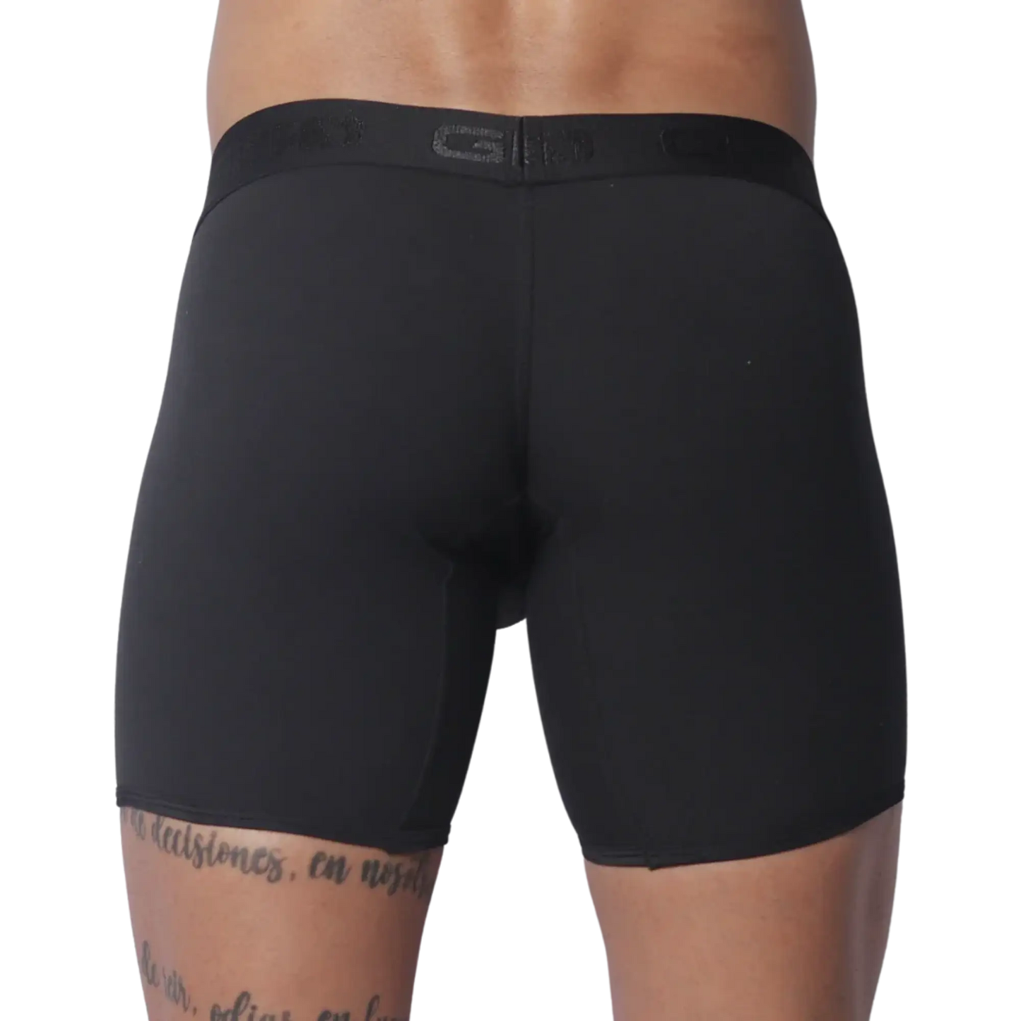 Solid black fitted boxer trunks with a wide, tonal branded elastic waistband.