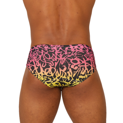 Vibrant black pink and yellow graffiti-patterned Gigo Crazy swimbrief swim trunks for bold poolside style
