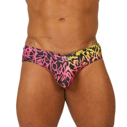 Gigo Crazy swimbrief vibrant pink and yellow graffiti-patterned swim trunks with black base for swimwear use