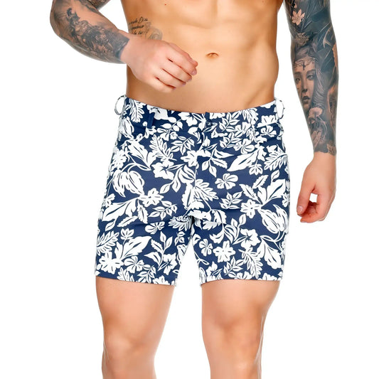 Navy blue Gigo Dynasty Blue short swim trunks with bold white tropical floral pattern for beachwear