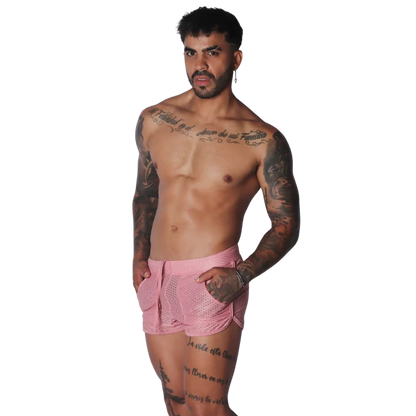 Pink, short-length athletic mesh shorts with a drawstring waist, side pockets, and rounded hem.