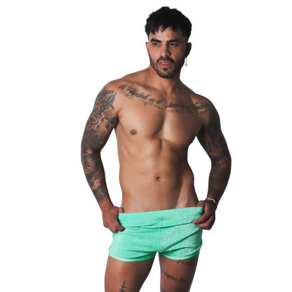 Gigo Flash Green short, a fitted, mid-thigh length lounge short in a bright, shimmering mint-green fabric.