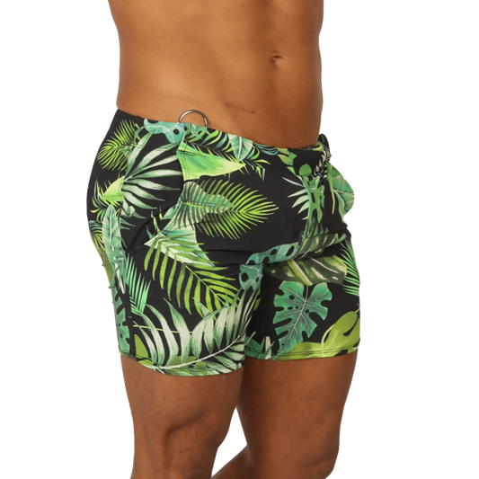 Black swim trunks with vibrant green tropical leaf pattern from Gigo Forest beachwear for summer beach use