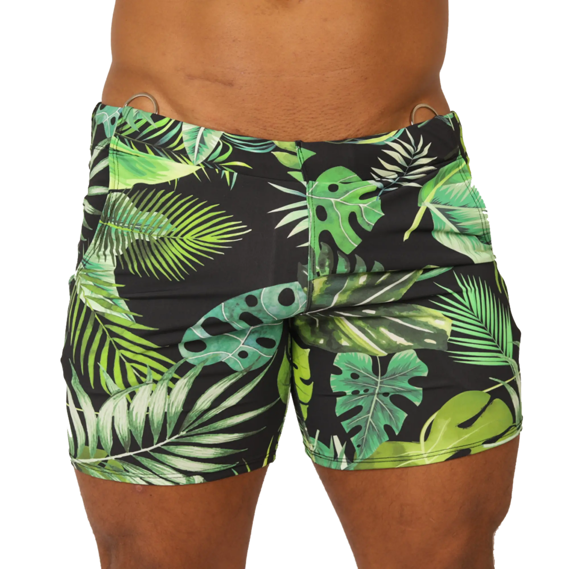 Black swim trunks with vibrant green and lime tropical leaf pattern and metallic silver waistband rings by Gigo Forest
