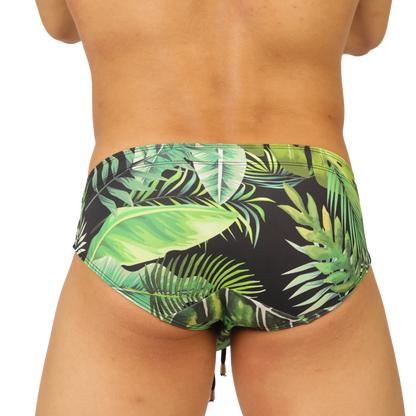 Black gigo forest swimbrief with vibrant green tropical leaf pattern made for swimming and beachwear