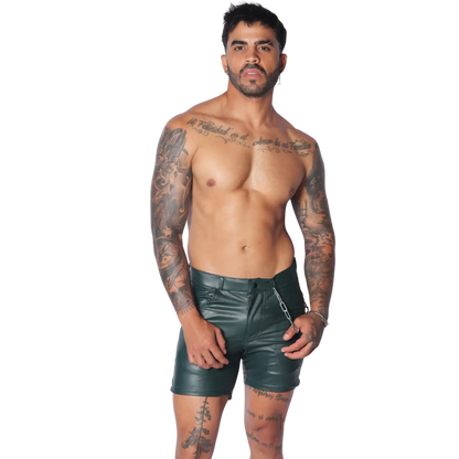 Men's dark green faux leather fitted shorts with a zipper closure and a silver chain accessory at the waist.