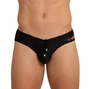 Black swim trunks with drawstring closure and orange hashtag branding on the waistband from gigo hot black swim brief