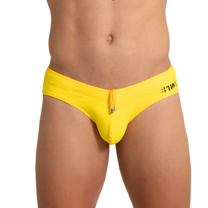 Bright yellow menâ€™s swim trunks gigo hot yellow swim brief with drawstring closure and black hashtag branding on the side