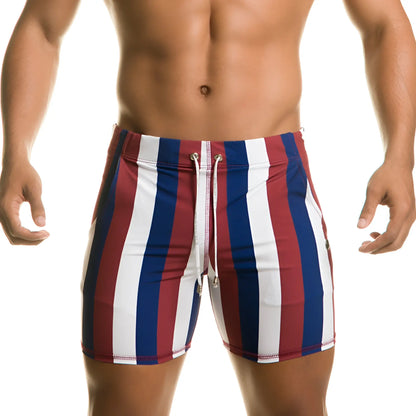 Menâ€™s Gigo Line Beachwear swim trunks with red white and blue vertical stripes and a drawstring waistband