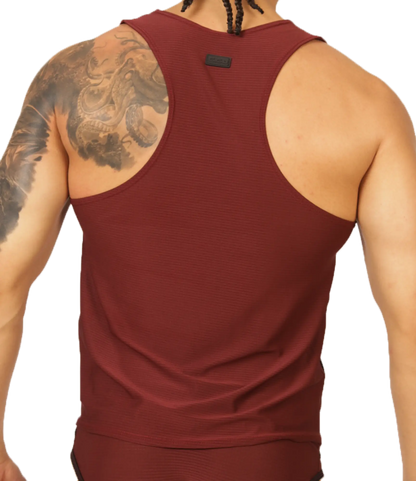 Maroon ribbed tank top with black brand tag at neckline in gigo mix wine tank style made from soft fabric