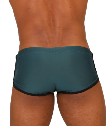Teal gigo nice green swim trunk with black trim designed for comfortable swimming and beachwear