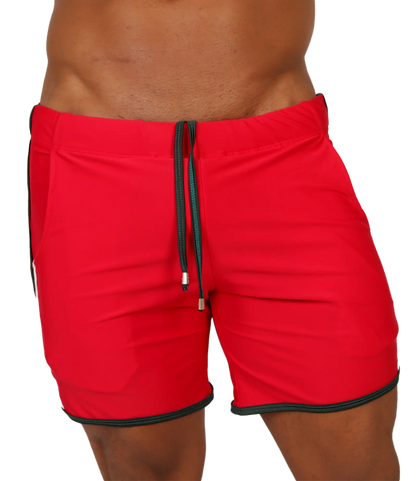 Red athletic shorts with black trim and drawstring waistband from Gigo Nice red beachwear collection for casual wear