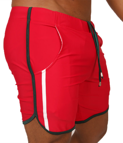 Red athletic shorts with white and black trim and drawstring waistband from gigo nice red beachwear collection