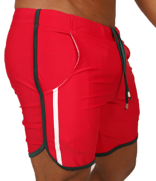 Red athletic shorts with white and black trim and drawstring waistband from gigo nice red beachwear collection