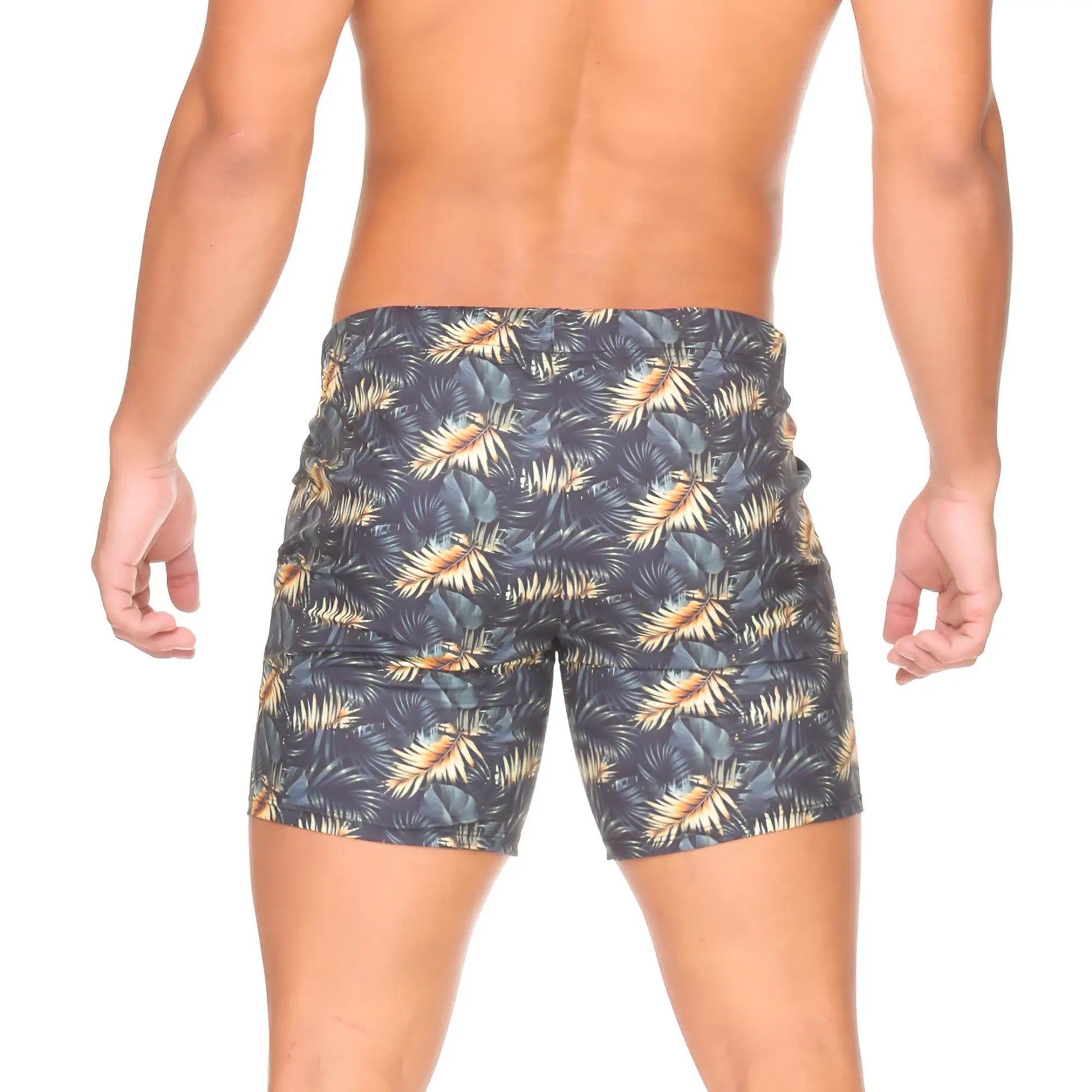 Dark blue gigo palms beachwear swim trunks with vibrant gold and green tropical leaf pattern for beach use
