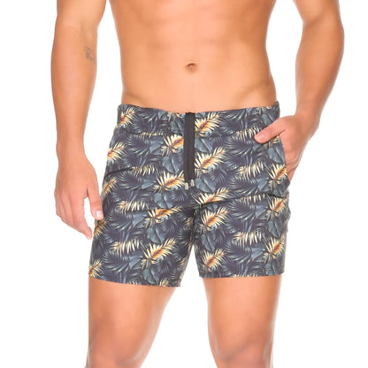 Menâ€™s dark gray Gigo Palms beachwear swim trunks with vibrant gold and teal tropical leaf pattern and black zipper fly