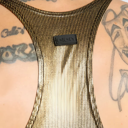 A shimmering gold mesh tank top with a black rectangular Gucci logo patch in the center called Gigo Shinese Tank