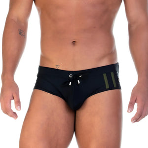Gigo Soccer black swim brief with olive green vertical stripes and silver-toned drawstring hardware for swimming