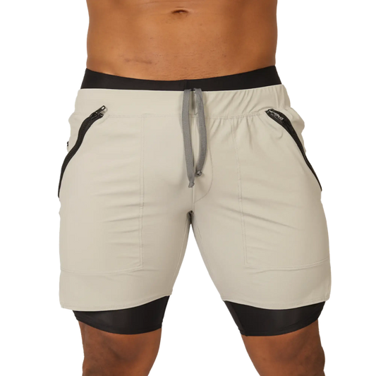 Cream-colored Gigo sporty gray short with black trim, side zippers, and drawstring waistband for athletic use