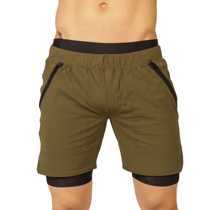 Gigo sporty green olive shorts with black elastic waistband and side zip pockets suitable for athletic use