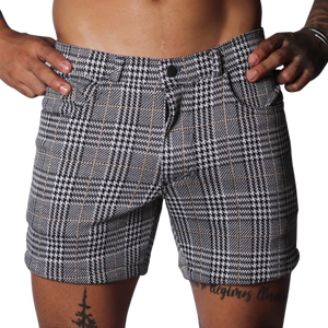 Black and white houndstooth print shorts with a subtle gold windowpane check, featuring a classic five-pocket design.
