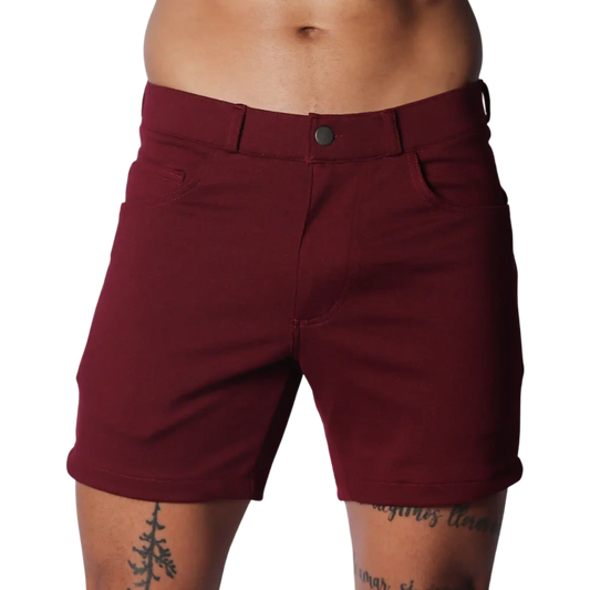 Wine-colored tailored shorts with a structured waistband, button closure, and classic five-pocket design.