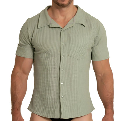 A menâ€™s short-sleeved button-up gigo tissue green shirt in textured light sage green fabric with classic collar
