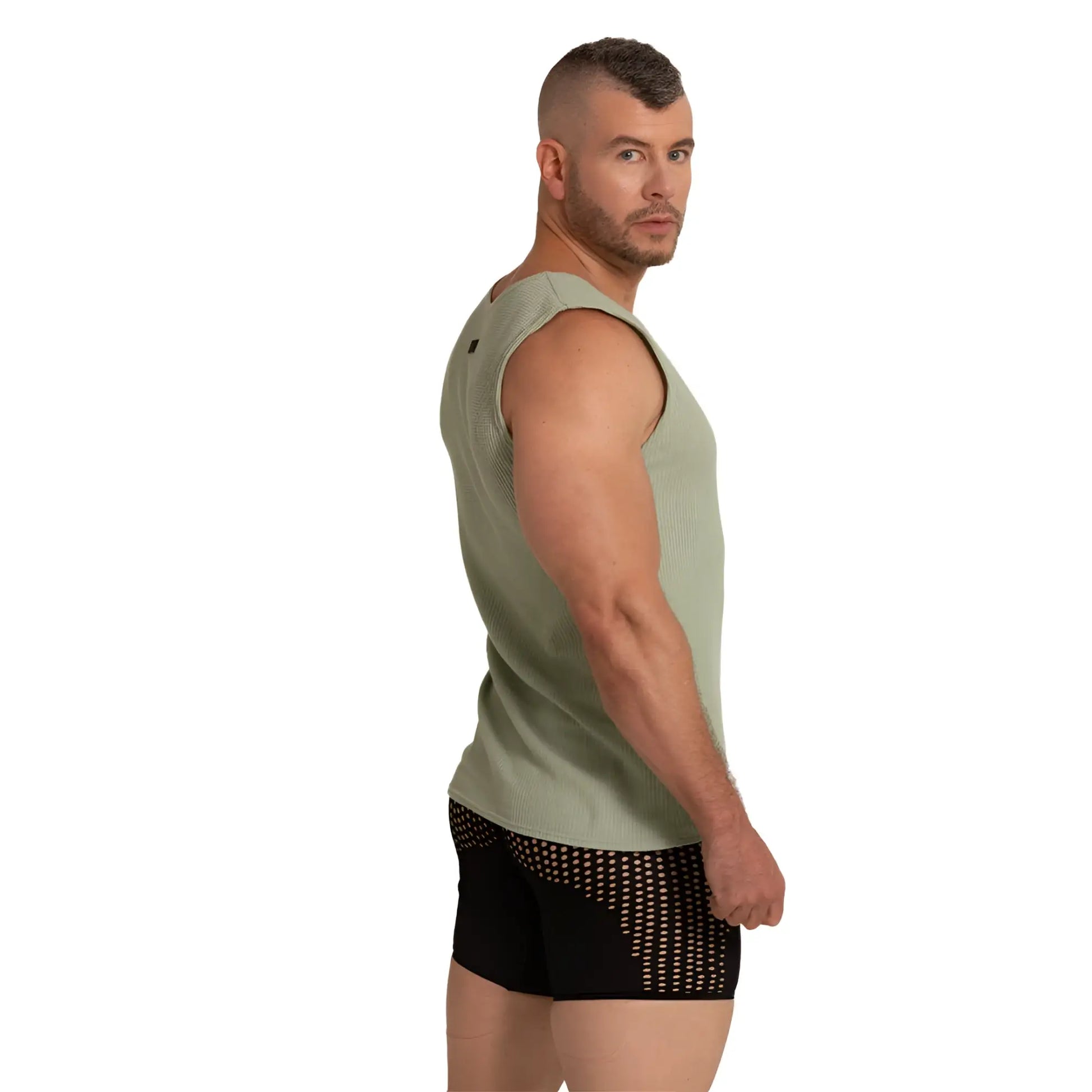 Olive green ribbed sleeveless athletic tank top made from lightweight gigo tissue fabric for active wear
