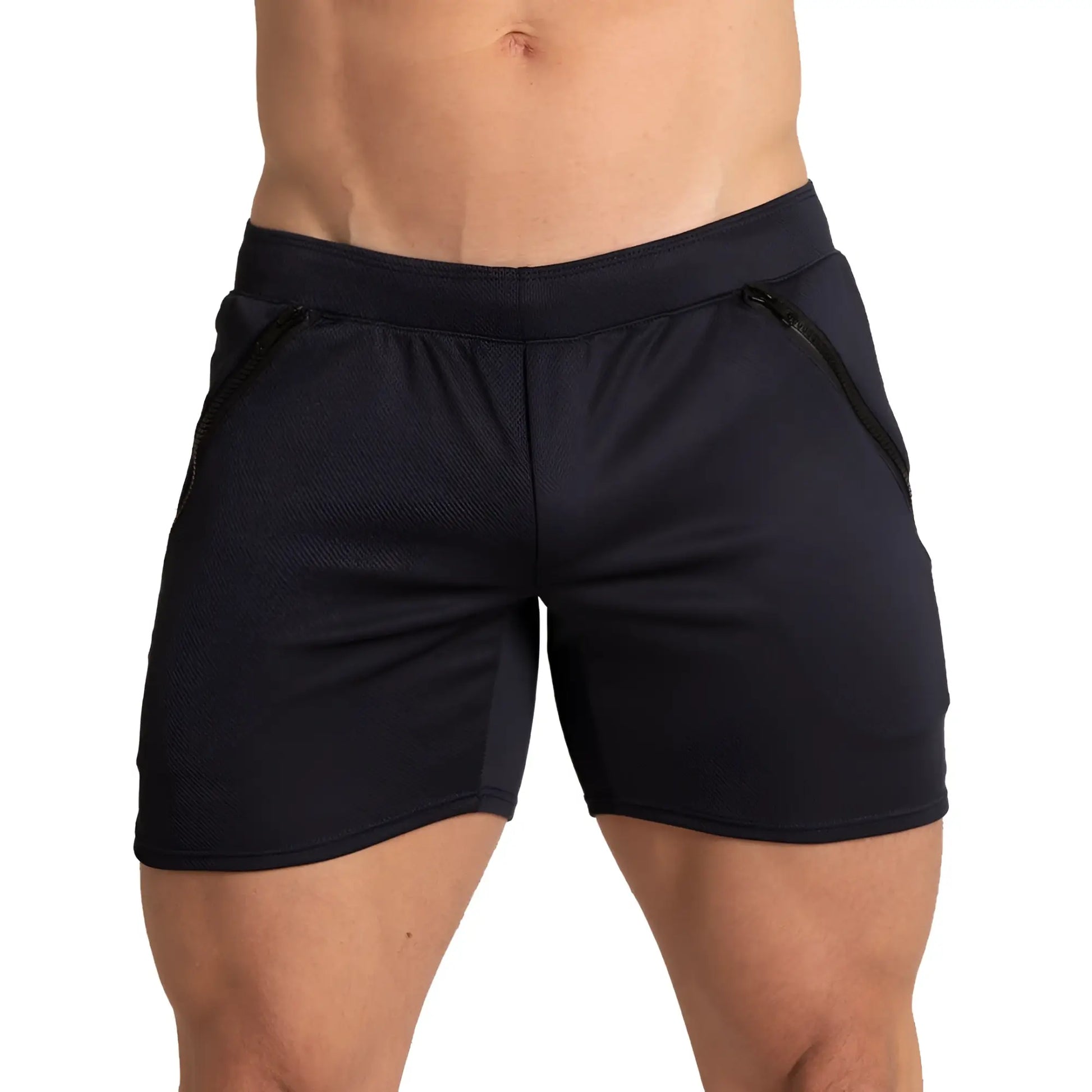 Black gigo training shorts with textured fabric and side zip pockets for athletic use