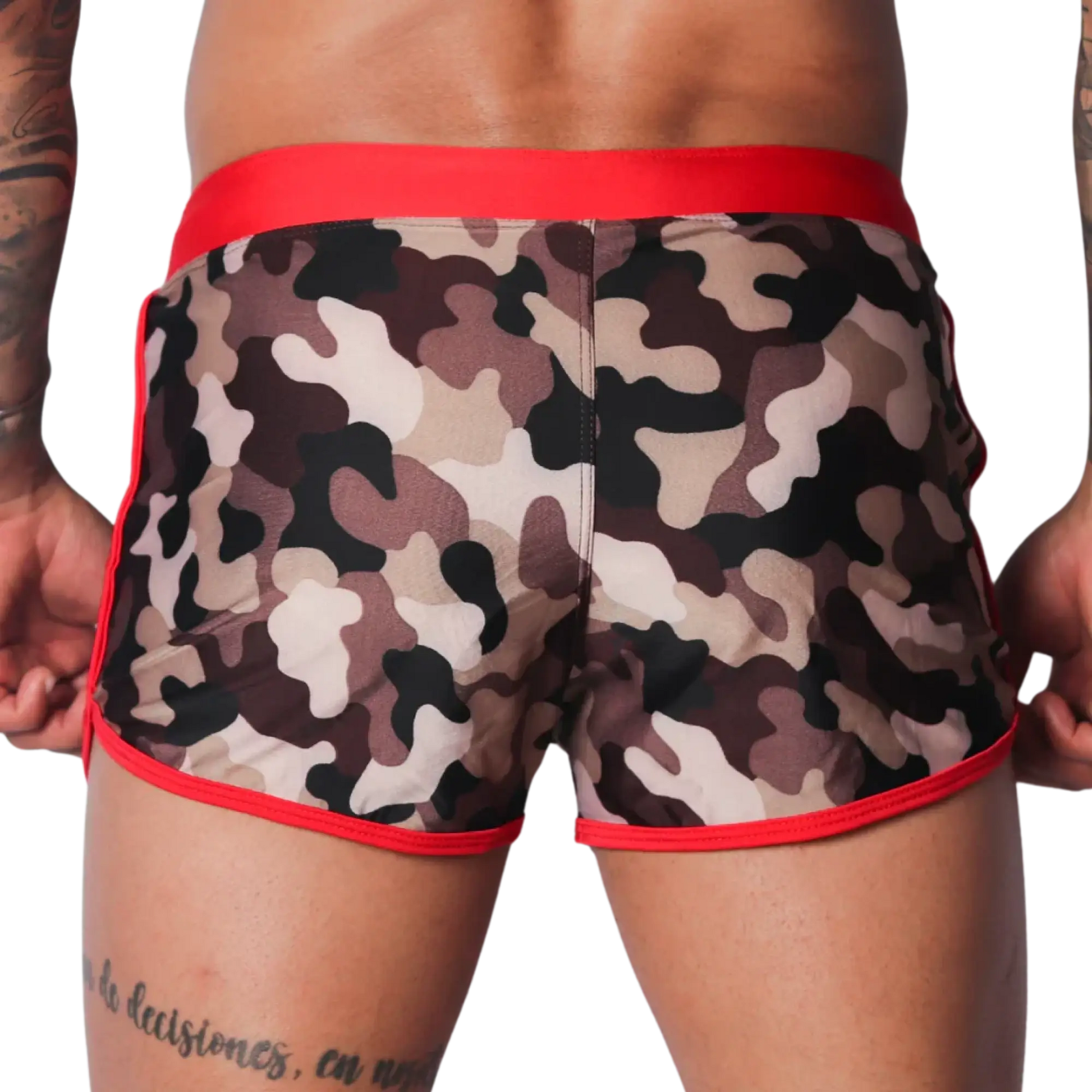 Short camo-print swim trunks with a wide red waistband and red piping trim along the leg openings.