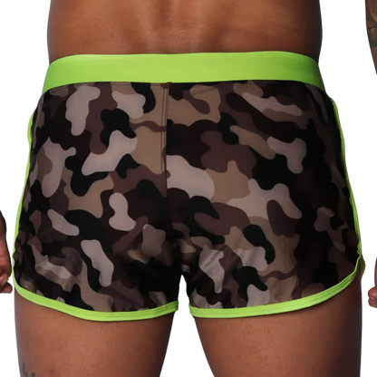 Camouflage print beach shorts with neon yellow waistband and trim, featuring a smooth, athletic fit.