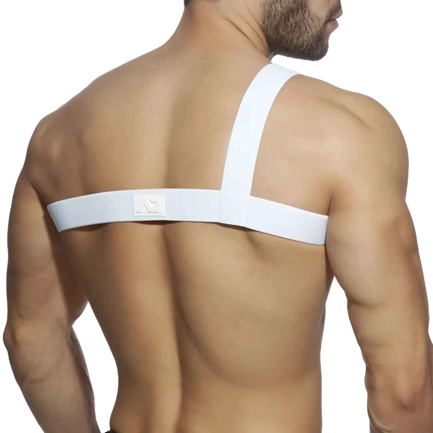 Back view of white gladiator clip harness with elastic strap, subtle textured weave, and small logo patch