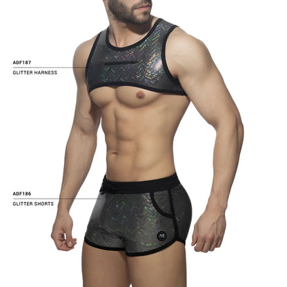 Black and iridescent glitter harness with mesh design paired with matching shorts for bold festival wear