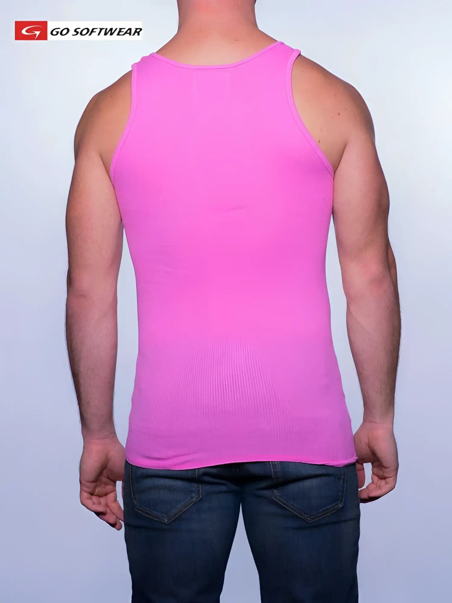 A vibrant deep pink ribbed tank top from Go Softwear made of soft fabric in size small