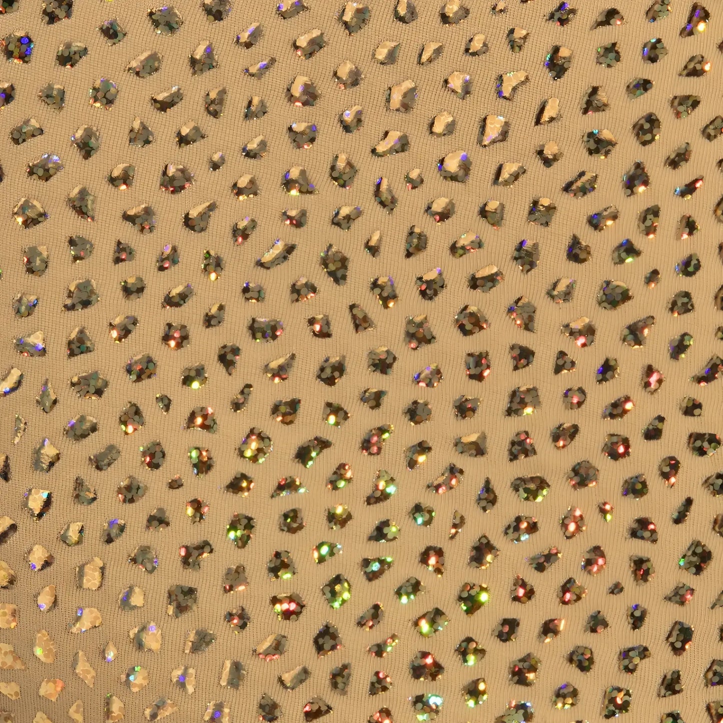 Gold stones trunk fabric features gold-toned material with iridescent rhinestones in a leopard print pattern