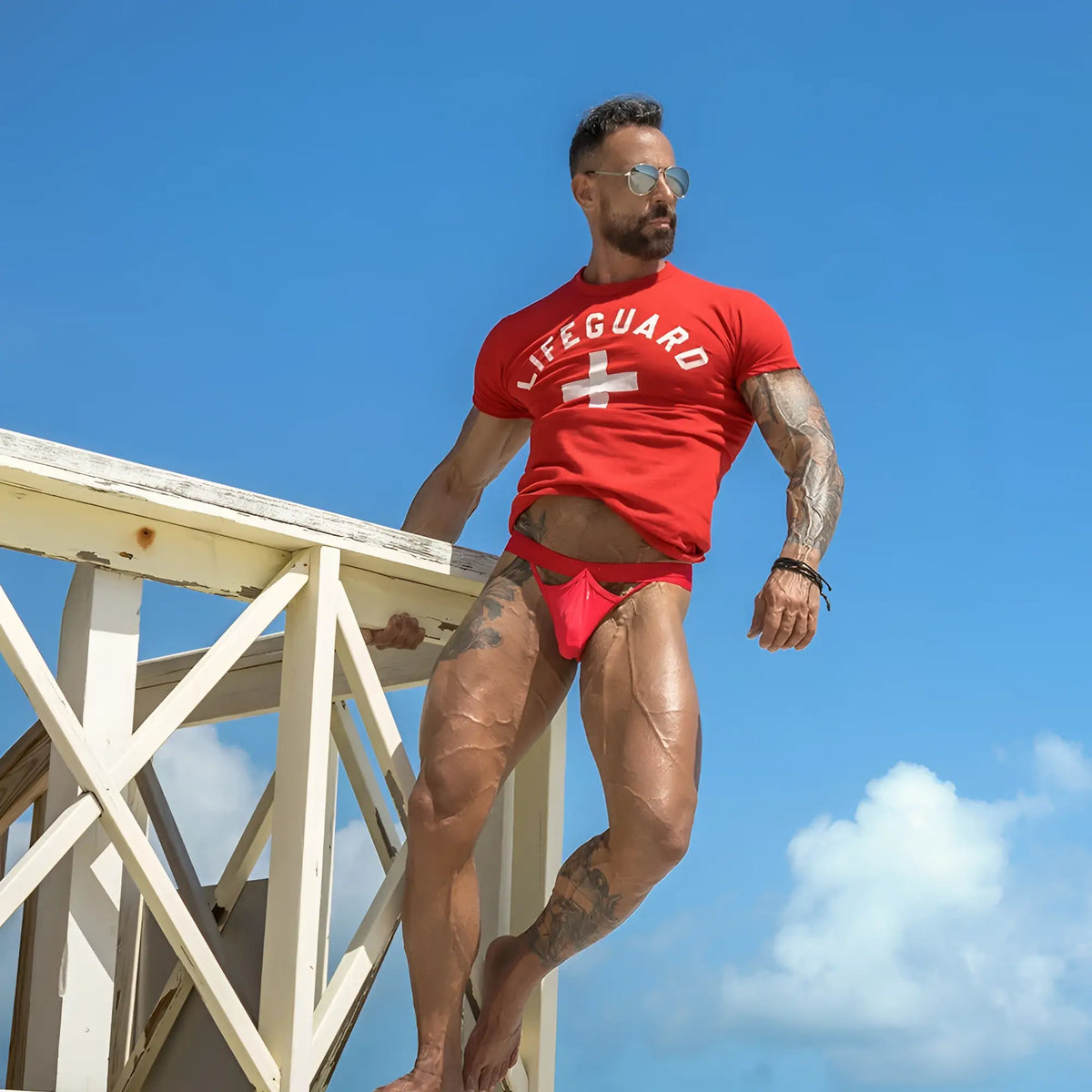 Red lifeguard t-shirt with white cross logo paired with good devil GDE057 jockstrap for active use