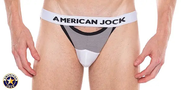 Men's jockstrap in platinum gray with a white waistband featuring 'AMERICAN JOCK' logo showcasing a sporty design