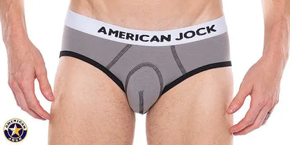 Men's gray core brief with black trim and American Jock logo on the waistband showcasing a snug fit and soft material