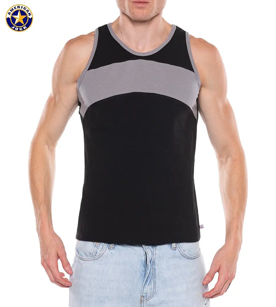 Men's tank top in black and gray featuring a color-block design made by AMERICAN JOCK worn by a model with muscular build