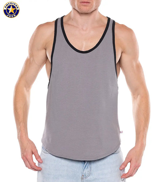 Men's platinum tank top with black trim made of soft material featuring a sleeveless design modeled by a man by AMERICAN JOCK