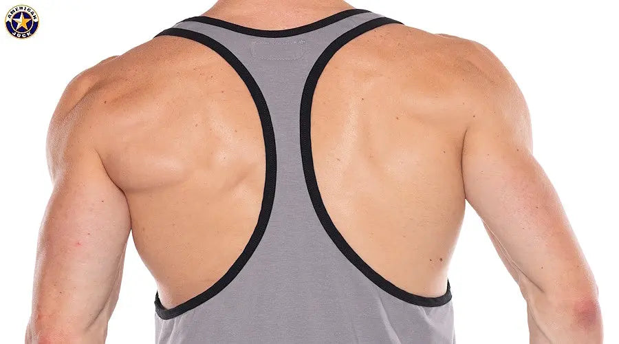 Men's gray tank top with a racerback design featuring black trim shown from the back highlighting muscular shoulders by AMERICAN JOCK
