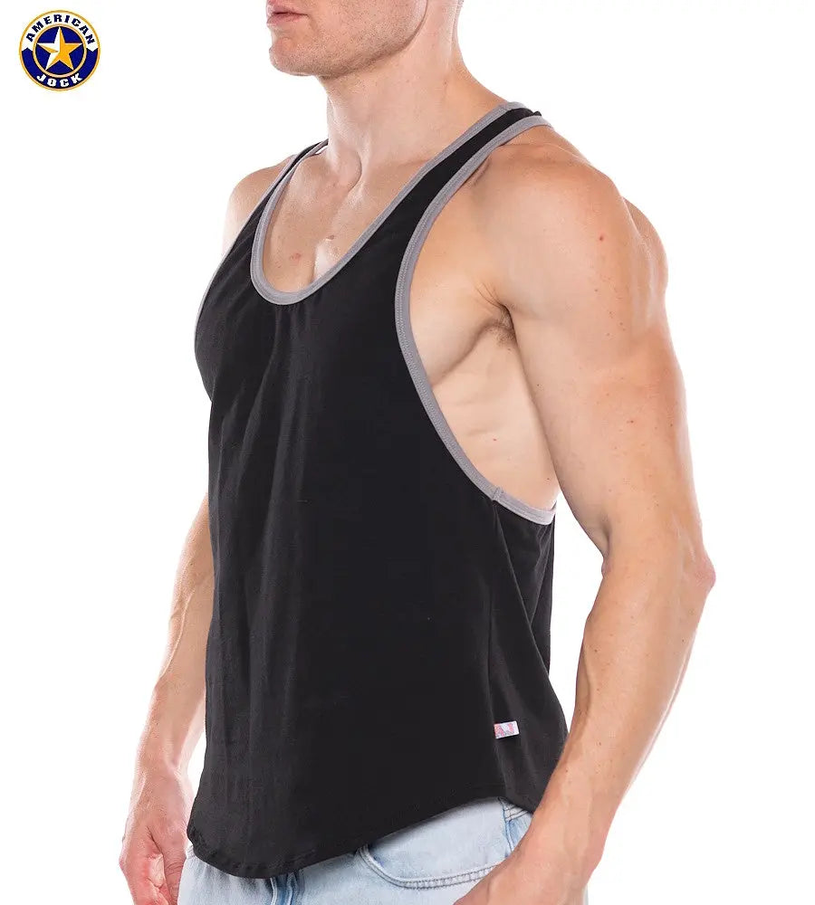 Black tank top with gray trim made of soft fabric worn by a model showcasing a fitted style by AMERICAN JOCK