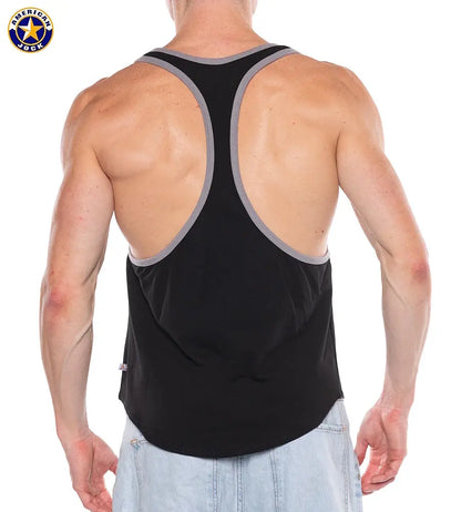 Men's black tank top with a racerback design featuring gray trim shown on a model from the back by AMERICAN JOCK
