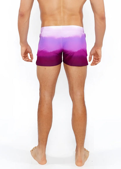 Gradient printed swim short featuring purple gradient swim trunks with a soft transition from lavender to deep violet