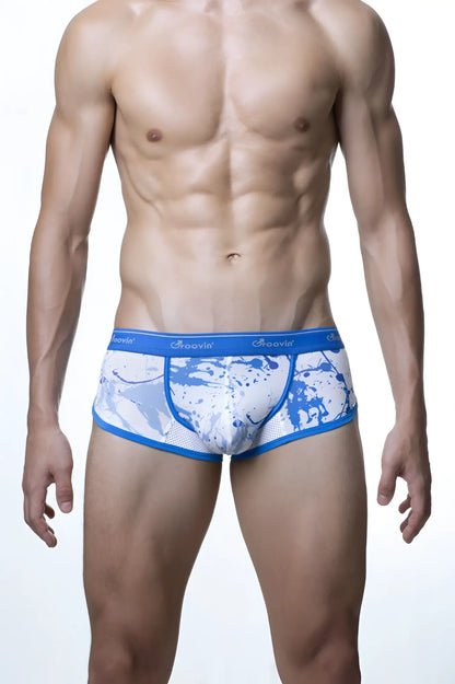 Blue and white splatter-patterned men’s briefs with blue elastic waistband featuring saoovin logo groovin underwear cbp1804