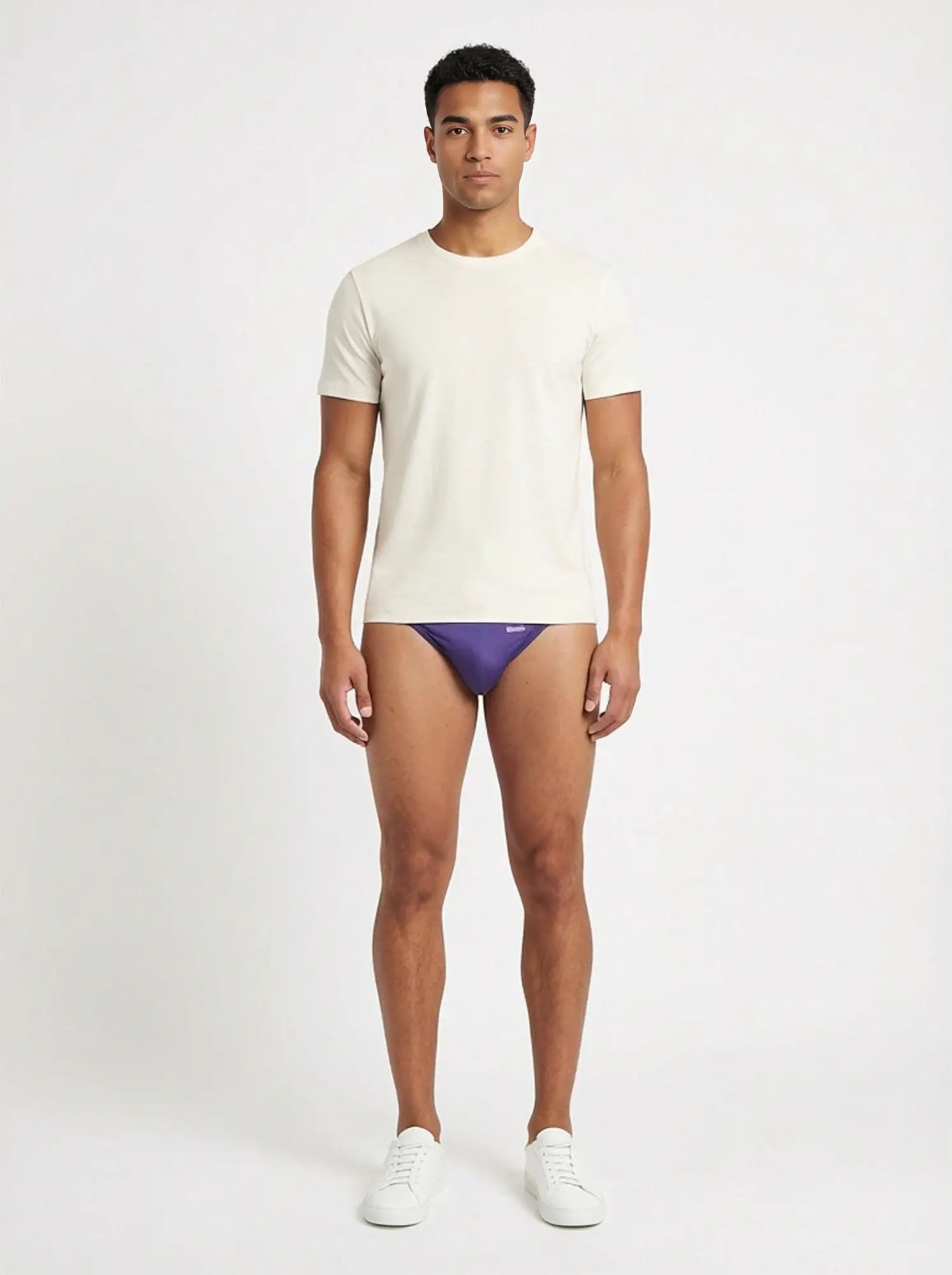 Purple groovin underwear string bikini briefs with subtle logo on waistband in indigo purple color