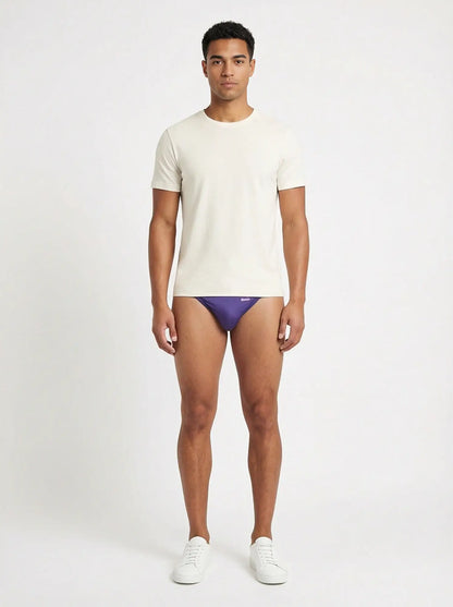 Purple groovin underwear string bikini briefs with subtle logo on waistband in indigo purple color