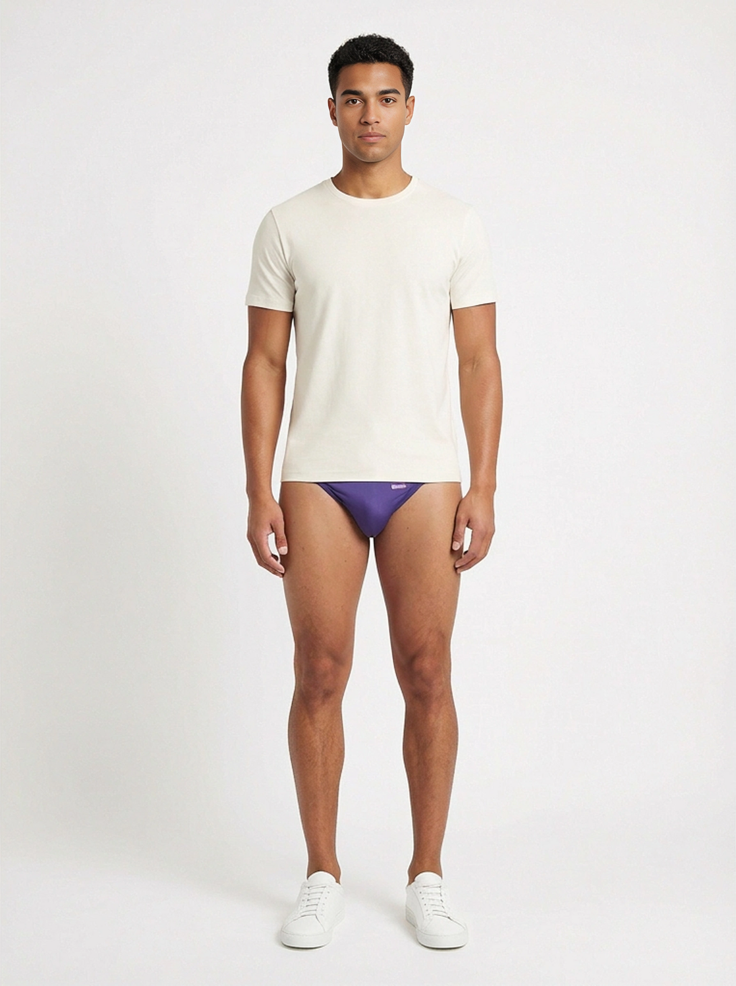 Purple groovin underwear string bikini briefs with subtle logo on waistband in indigo purple color